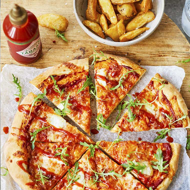 TABASCO® Brand Sriracha Sauce on pizza