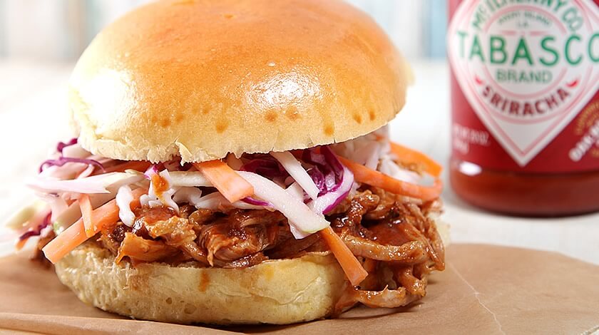 Sriracha Glazed Pulled Pork Bun with Creamy Slaw