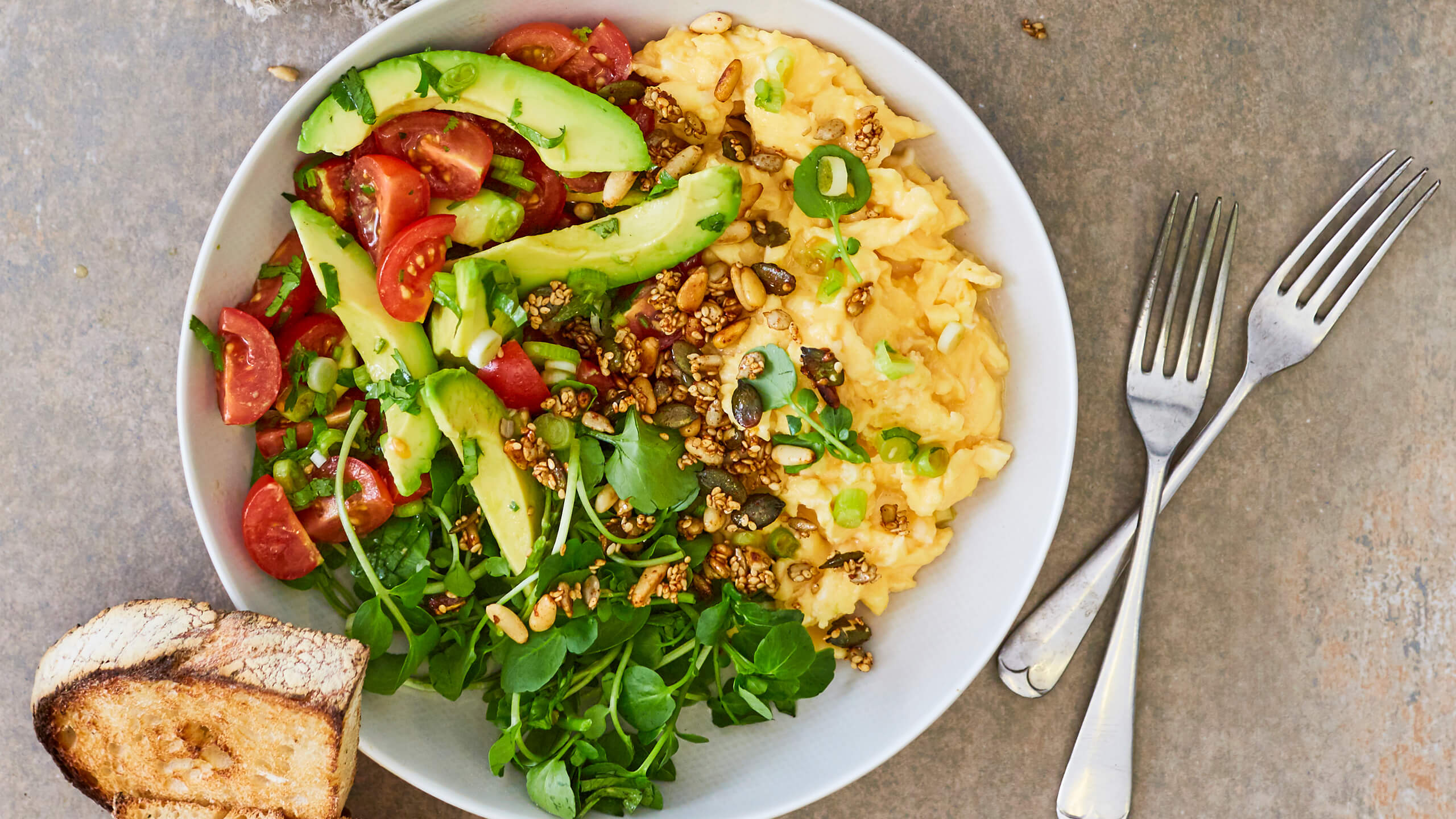 Avocado and Scrambled Egg Brunch Bowl with Sweet and Spicy Seeds