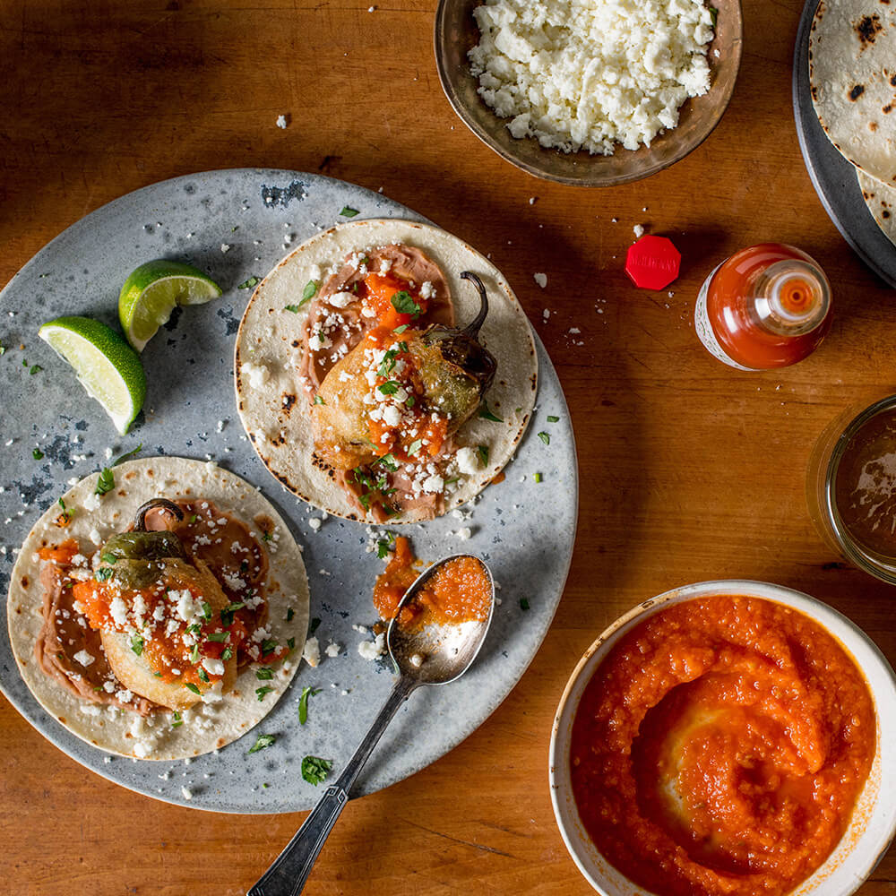 Chicken-Stuffed Chile Relleno Tacos with Spicy Tomato Sauce